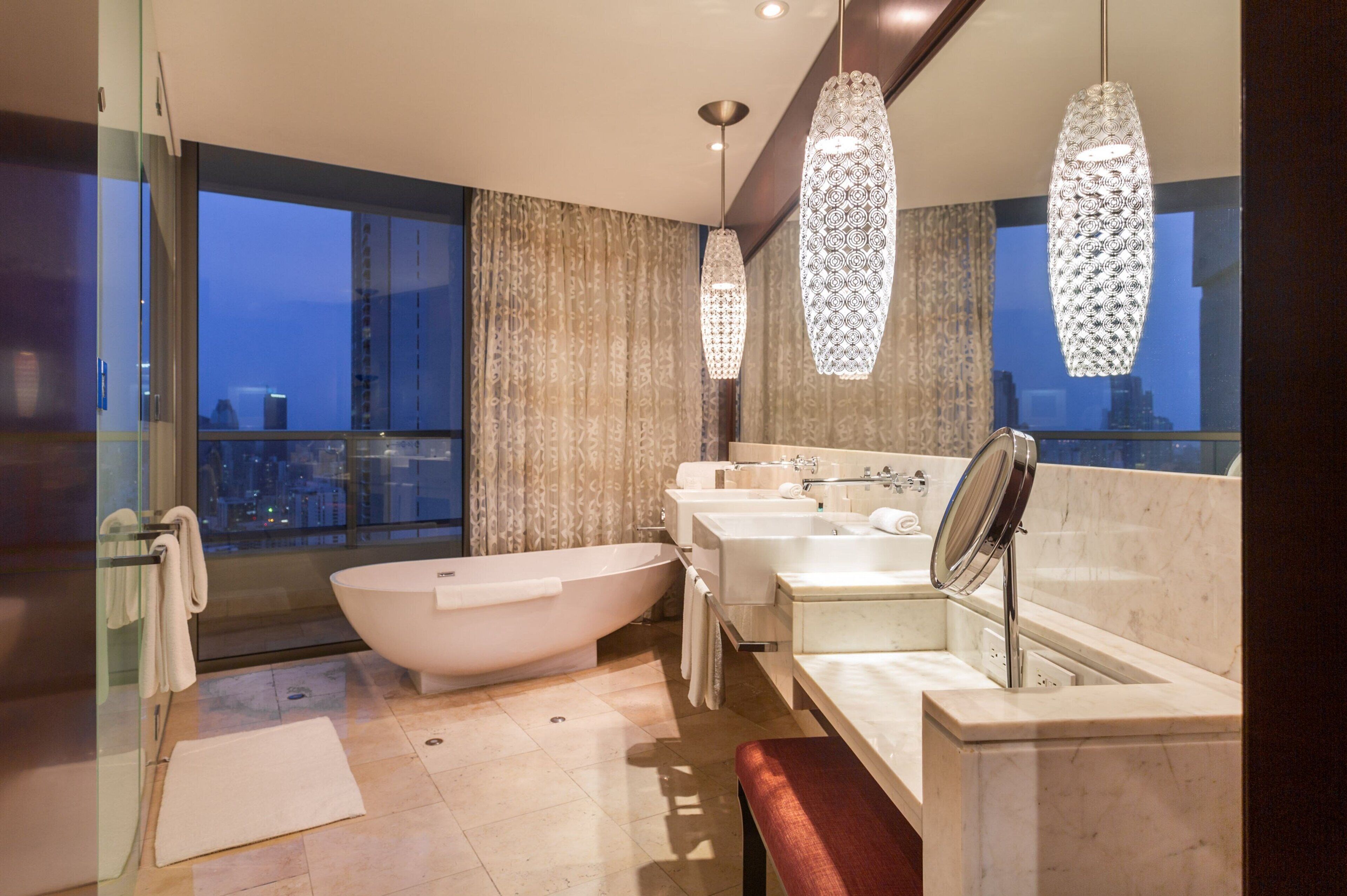 separate bathtub and shower, designer toiletries, hair dryer, slippers