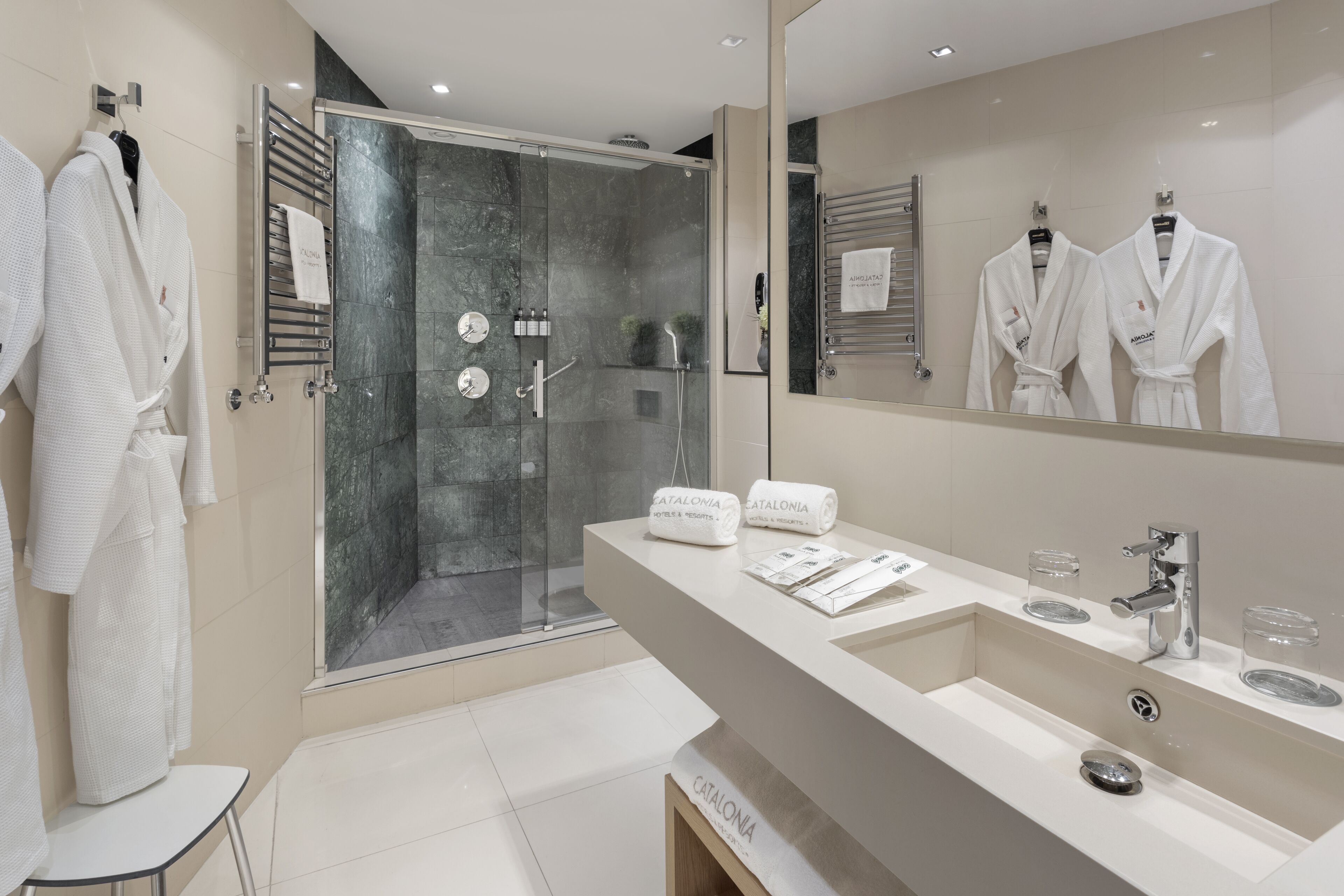 eco-friendly toiletries, hair dryer, towels