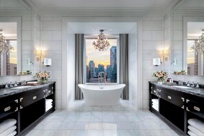 Separate bathtub and shower, free toiletries, hair dryer, bathrobes