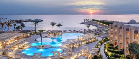 Outdoor pool, pool umbrellas, sun loungers