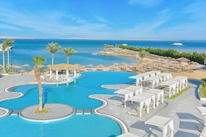 Outdoor pool, pool umbrellas, sun loungers
