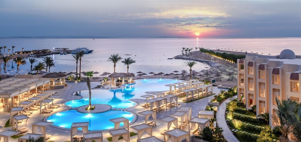 Outdoor pool, pool umbrellas, sun loungers