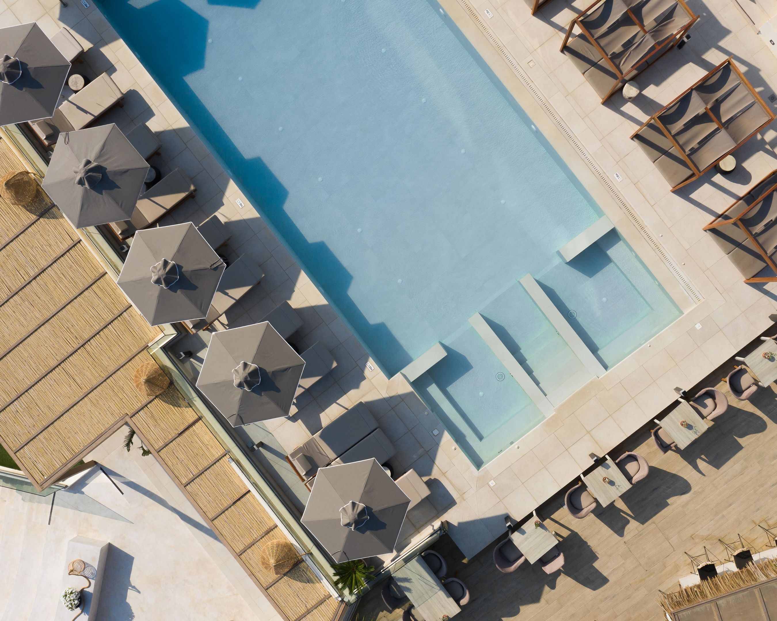 2 outdoor pools, pool umbrellas, pool loungers