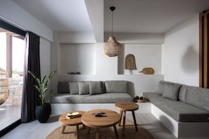 Junior Suite, 1 Bedroom, Sea View | Living area | 1-inch plasma TV with satellite channels, TV - Irida Mindful Living (Malevizi)