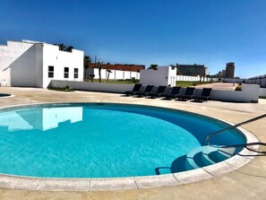 Outdoor pool, open 10:00 AM to 10:00 PM, free pool cabanas