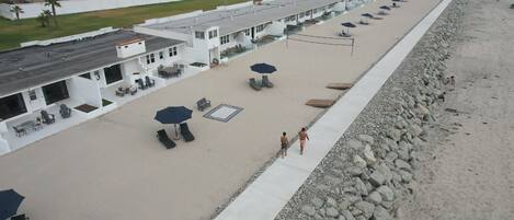 Private beach, beach volleyball, surfing