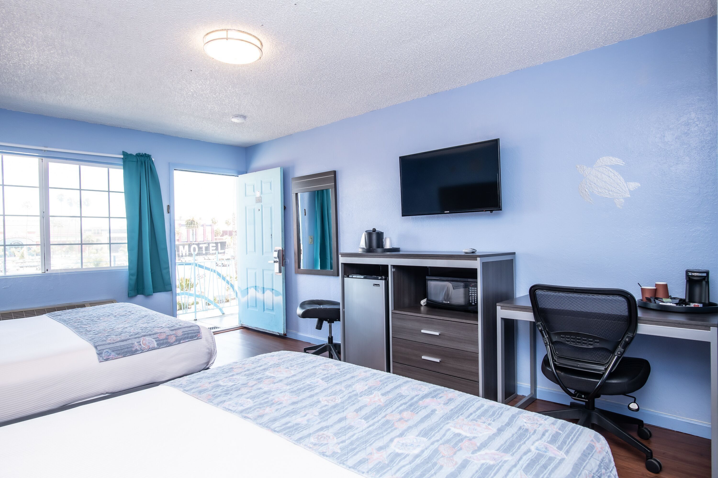 Desk, blackout curtains, free WiFi, bed sheets