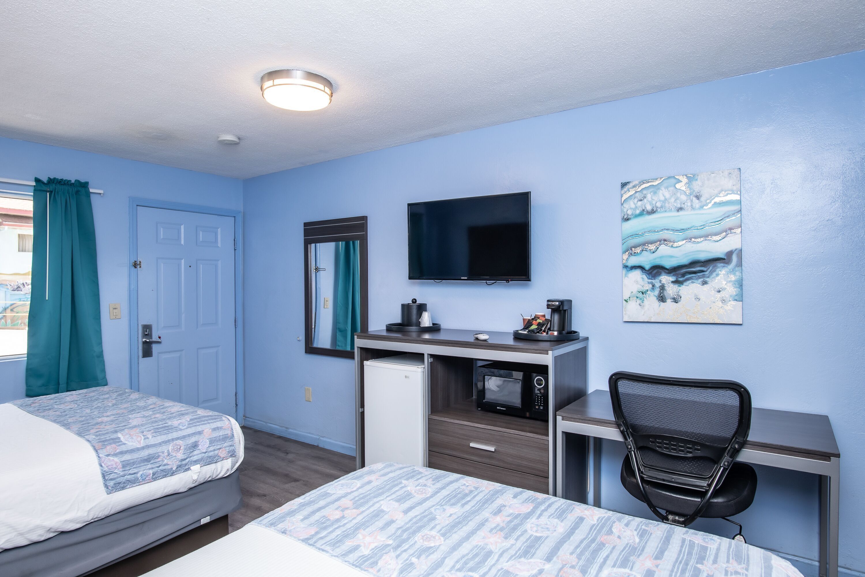 Desk, blackout curtains, free WiFi, bed sheets