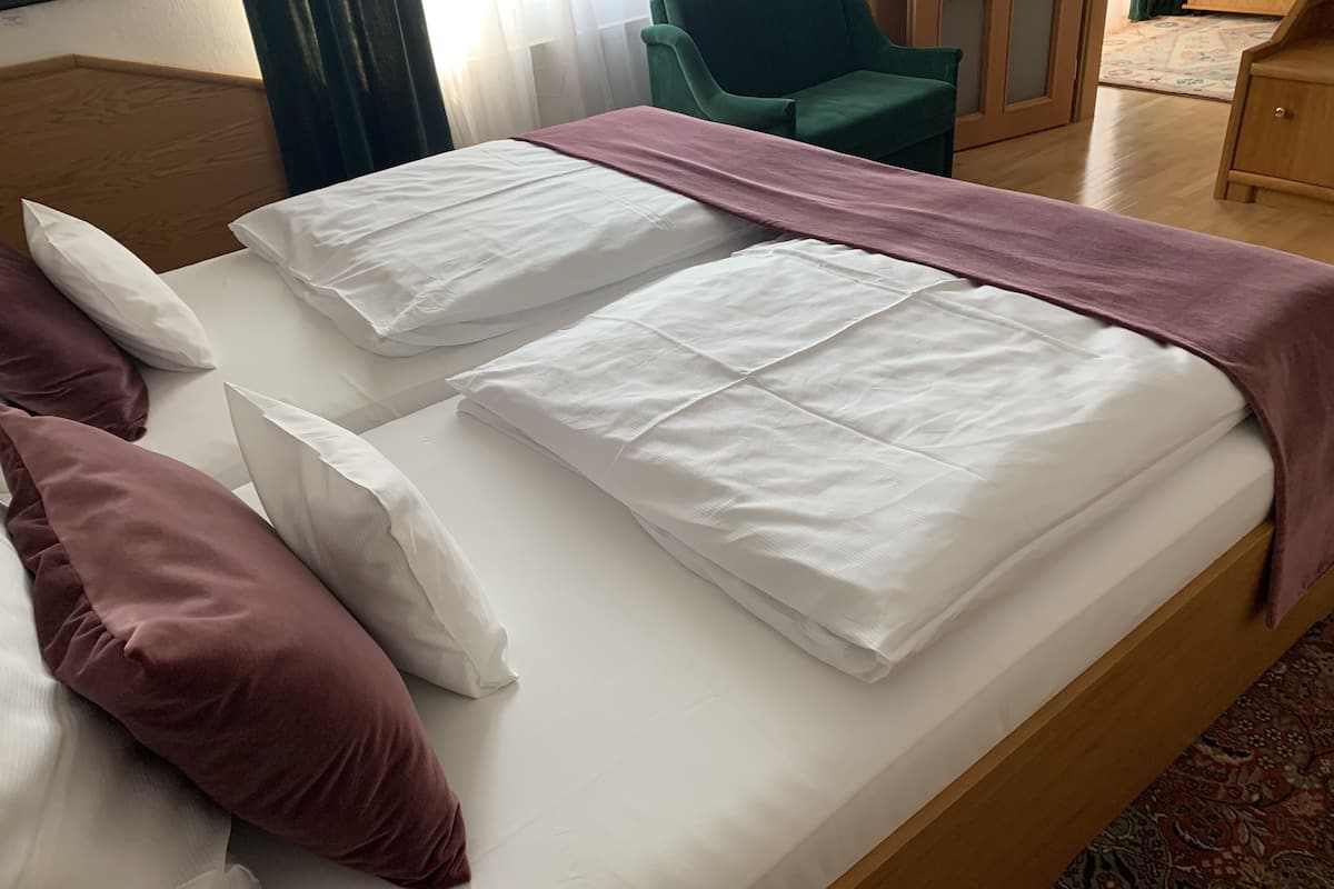 exclusive suite (suite 005) | bathroom | shower, designer toiletries, hair dryer, slippers