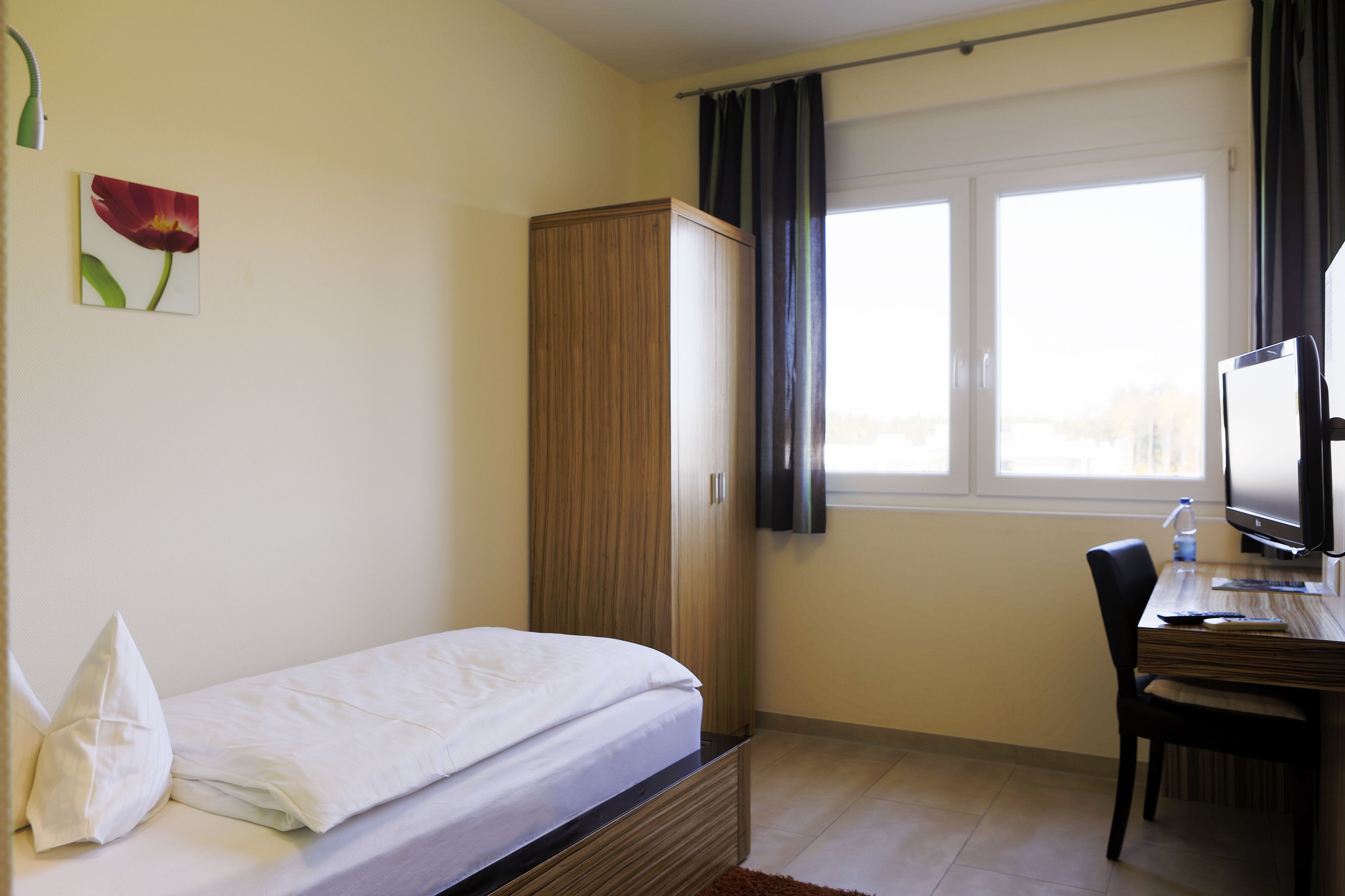 single room | in-room safe, desk, blackout curtains, free wifi