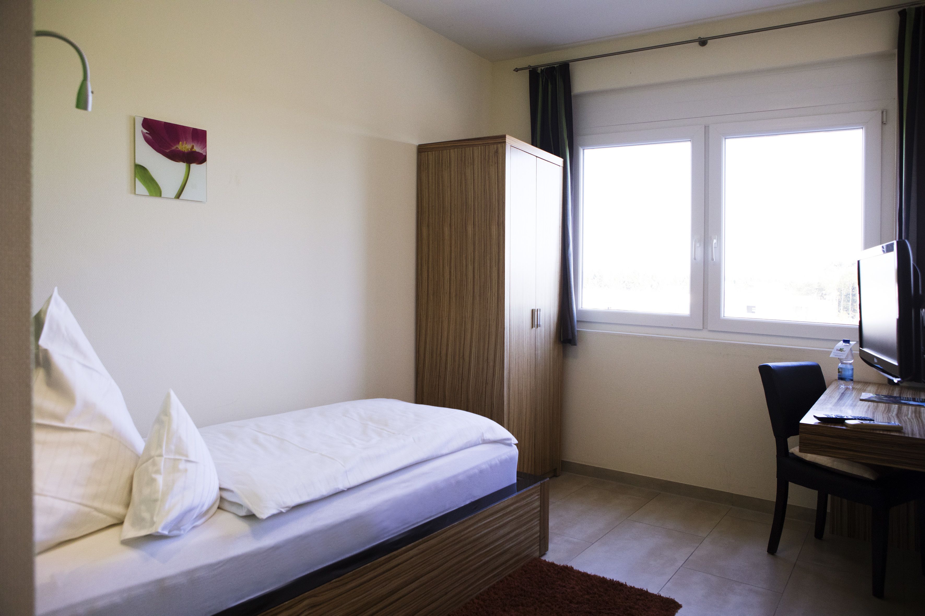 single room | in-room safe, desk, blackout curtains, free wifi