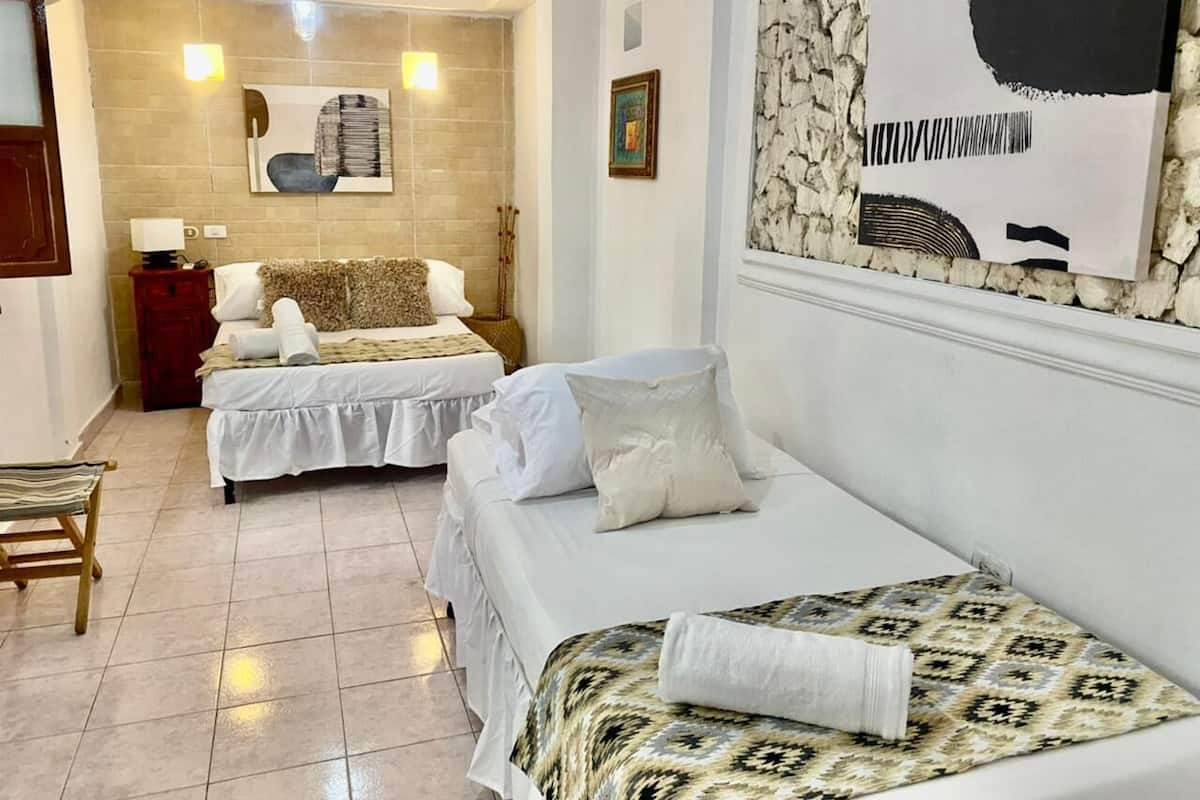 Triple Room | 6 bedrooms, Select Comfort beds, in-room safe, blackout drapes
