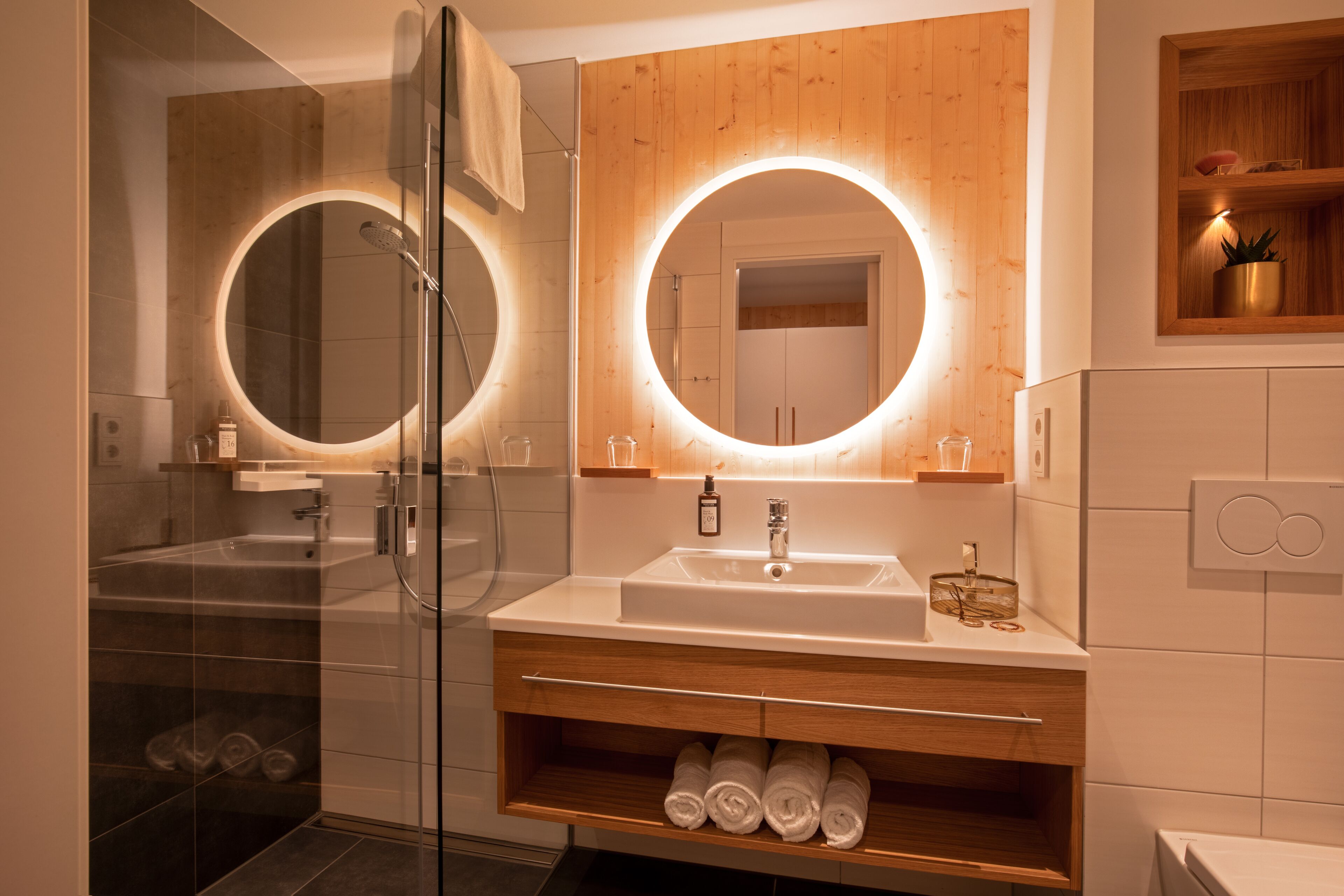 hair dryer, bathrobes, towels, soap