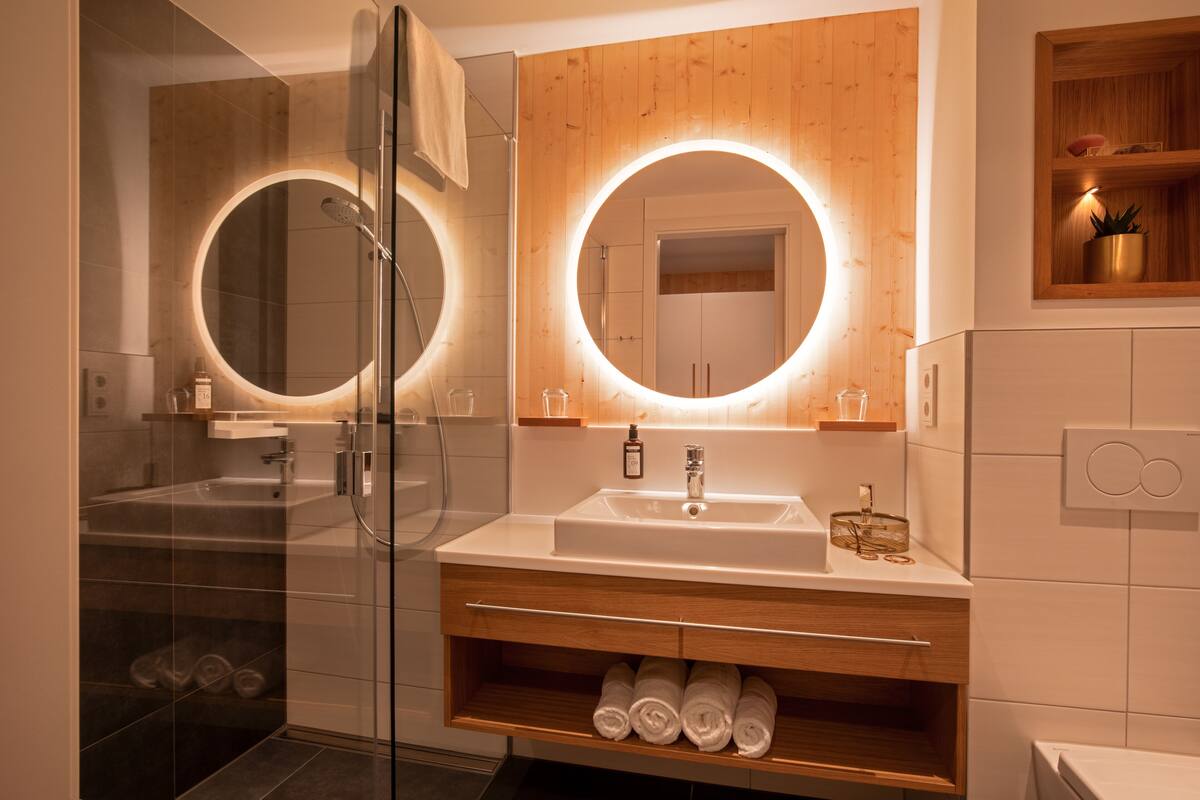 hair dryer, bathrobes, towels, soap