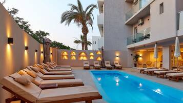 Outdoor pool, pool umbrellas, pool loungers