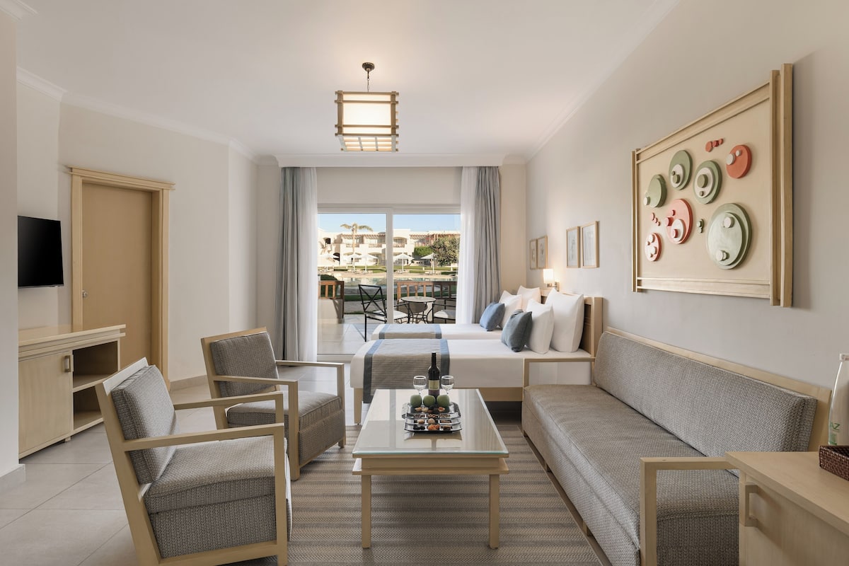 Family Room, Pool View | 1 bedroom, premium bedding, in-room safe, individually furnished