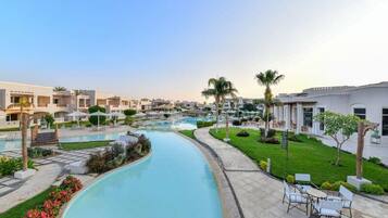 2 outdoor pools, pool umbrellas, pool loungers