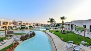 2 outdoor pools, pool umbrellas, pool loungers