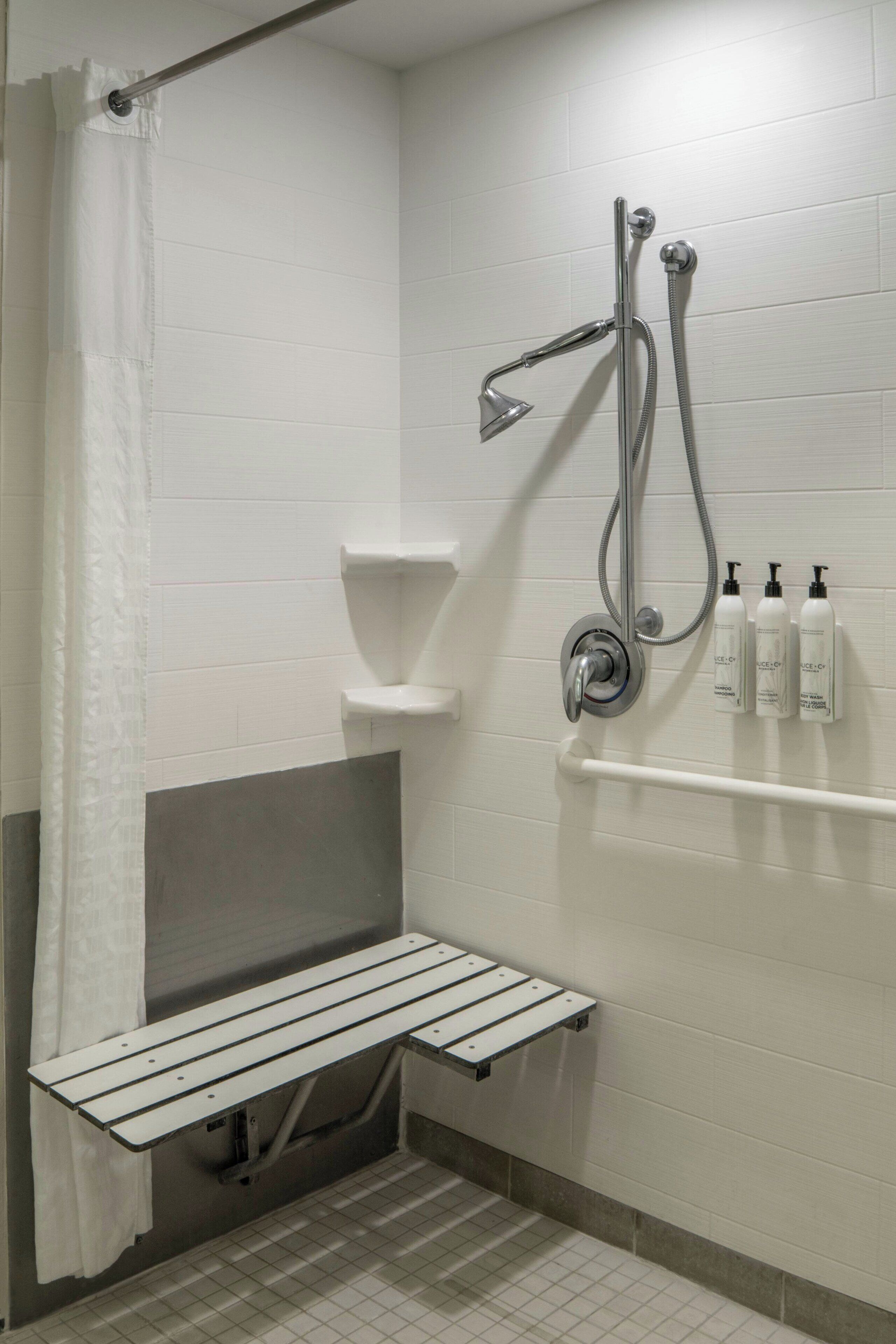 suite, multiple beds | bathroom | free toiletries, hair dryer, towels