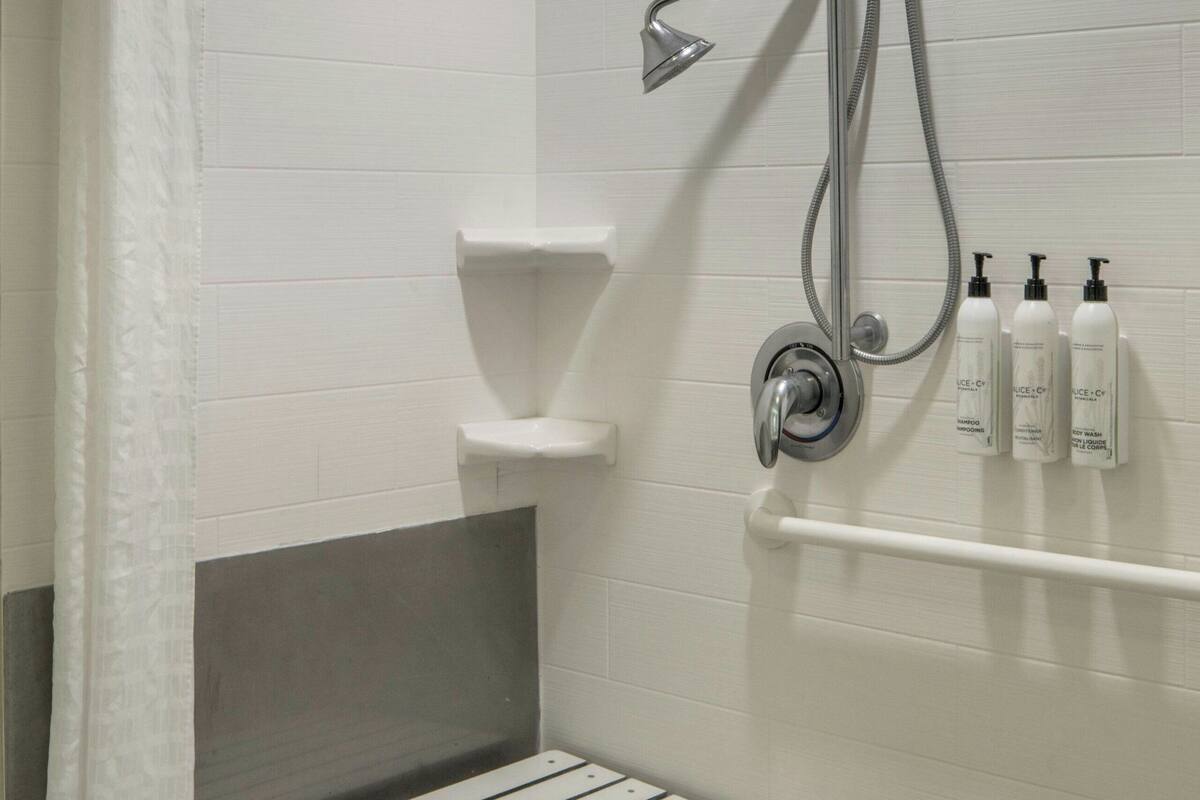 suite, multiple beds | bathroom | free toiletries, hair dryer, towels