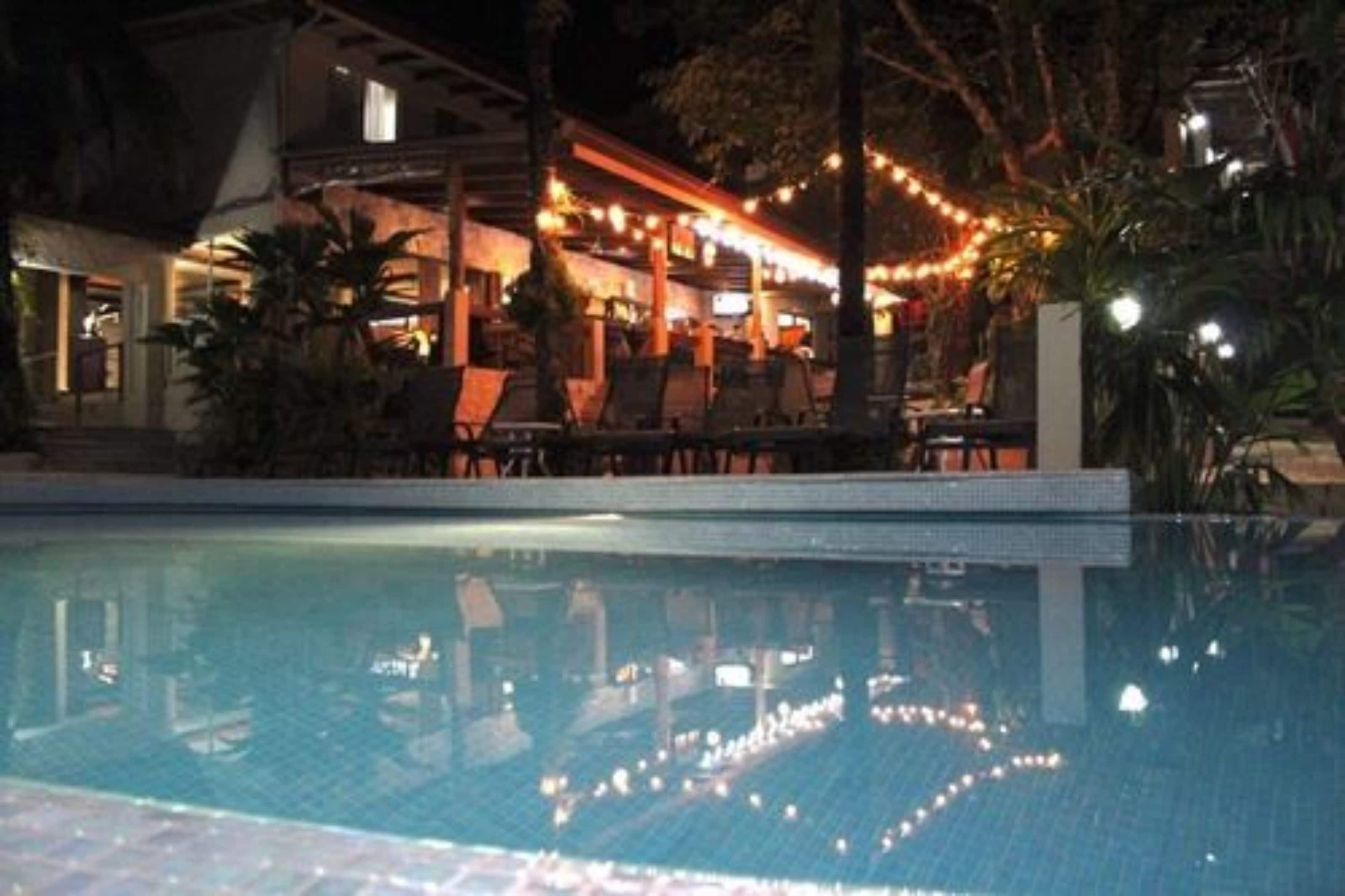 outdoor pool, pool umbrellas, pool loungers