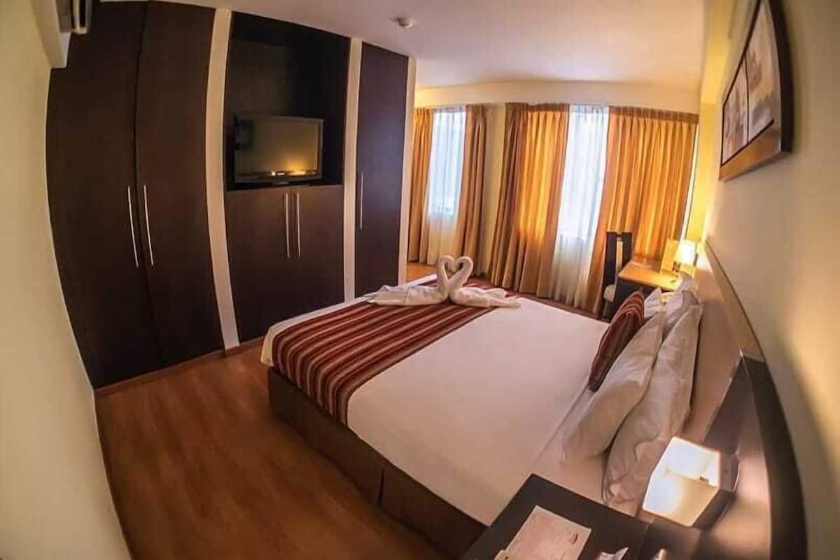 1 habitación, ropa de cama de alta calidad y minibar