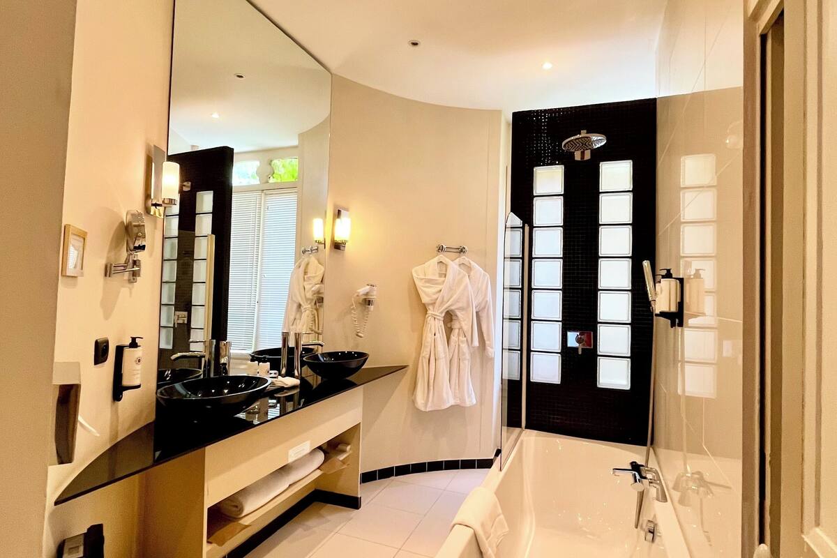 superior double room ( (in the castle)) | bathroom | eco-friendly toiletries, hair dryer, bathrobes, slippers