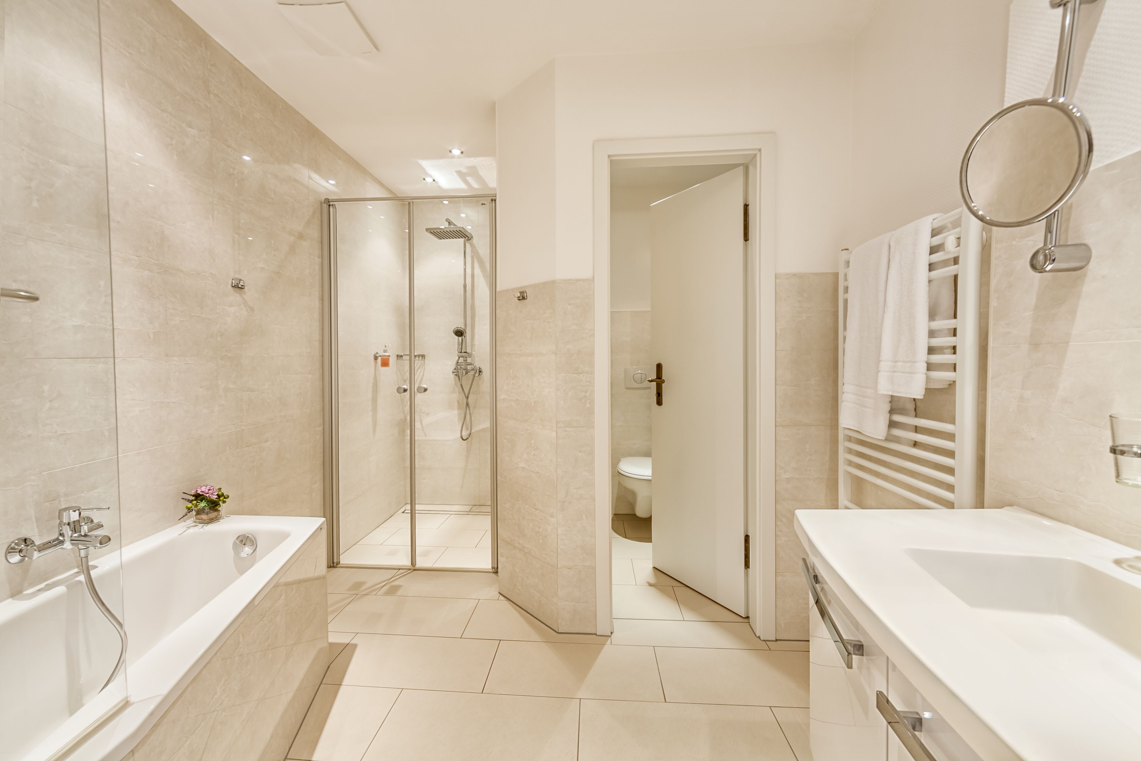 deluxe double room | bathroom | shower, hair dryer, bathrobes, slippers