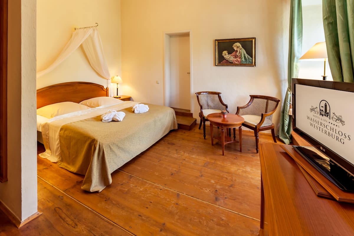Double Room | Minibar, in-room safe, individually decorated, desk