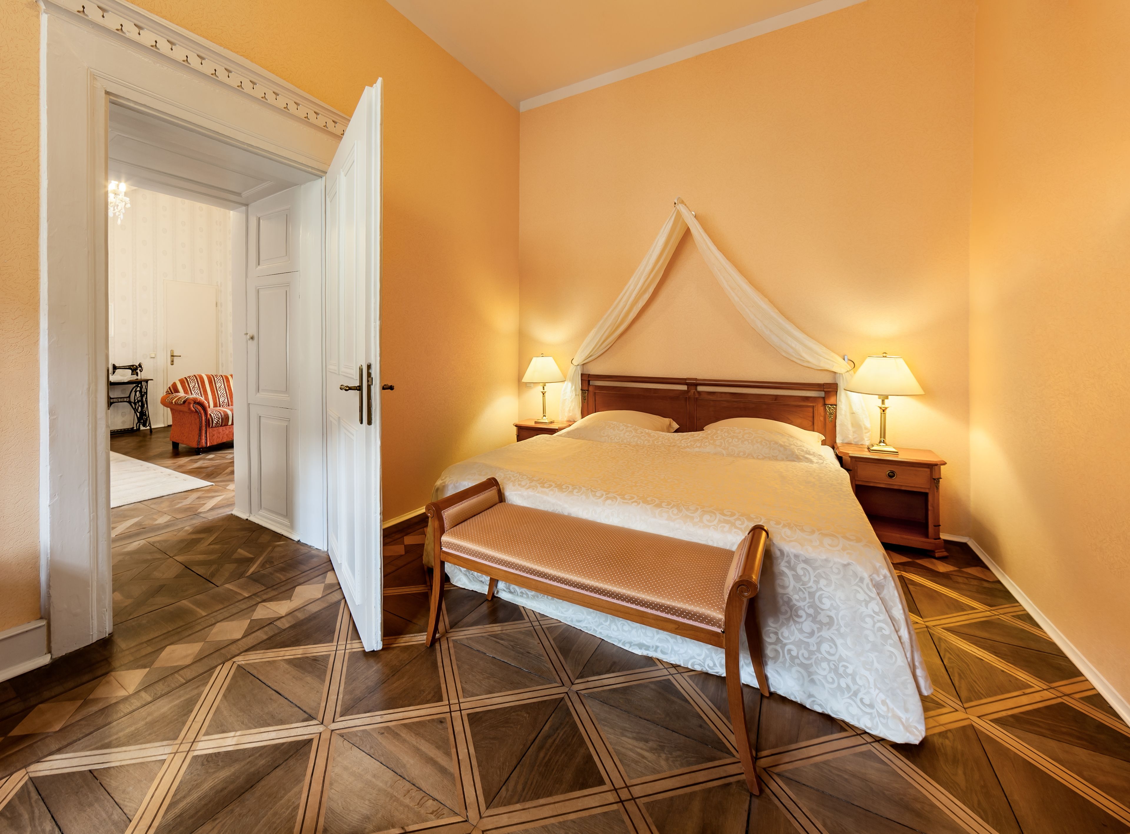 deluxe double room | minibar, in-room safe, individually decorated, desk