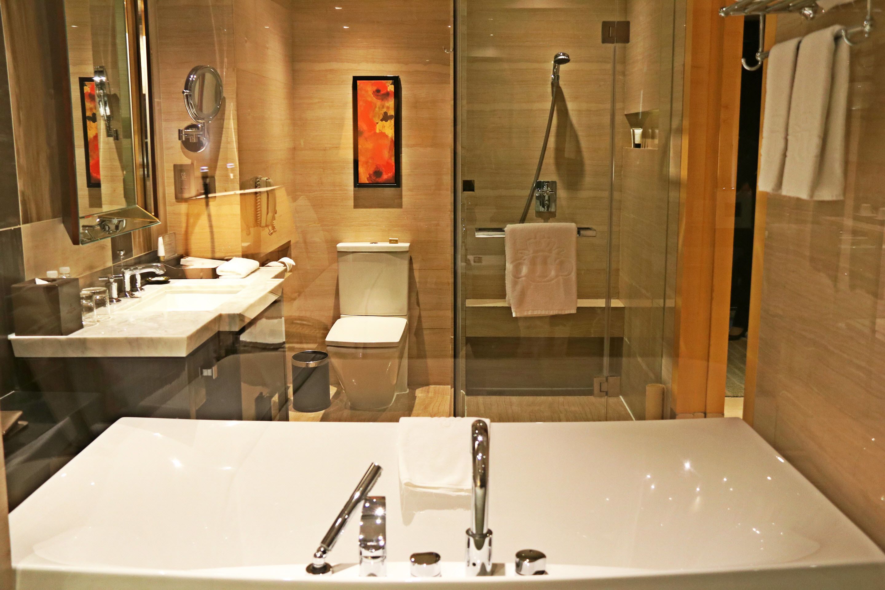 executive room | bathroom | separate bathtub and shower, deep-soaking bathtub, rainfall showerhead