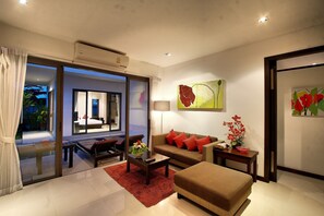 2 bedroom pool villa | Living area | 32-inch LCD TV with cable channels, TV, DVD player