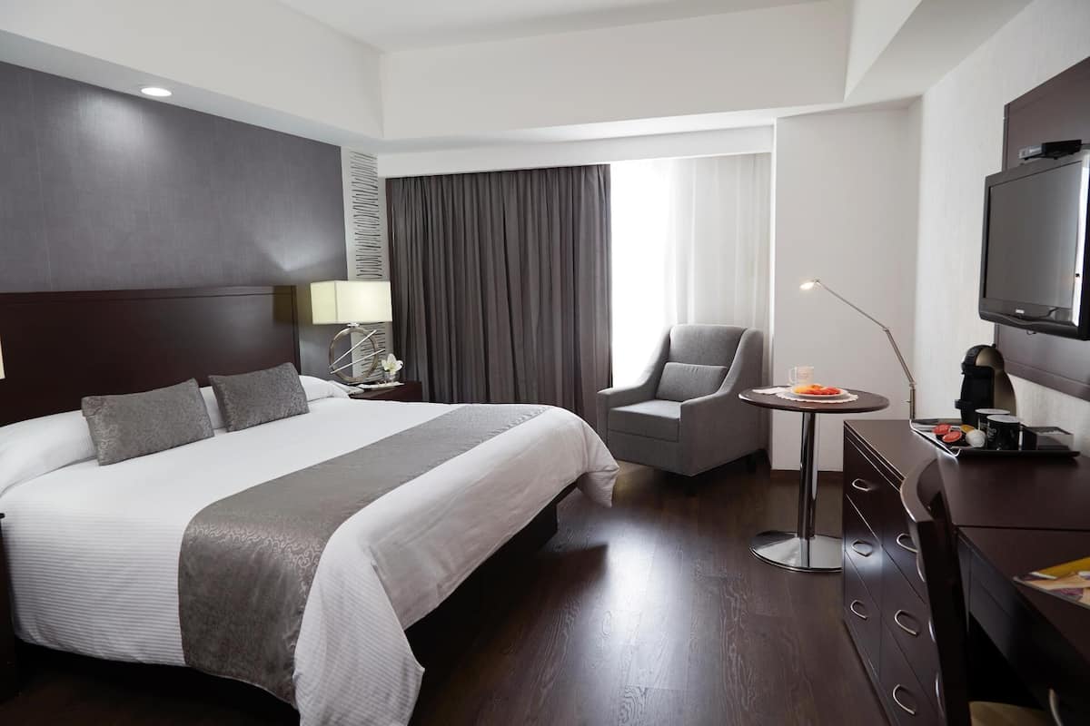 In-room safe, desk, laptop workspace, blackout curtains