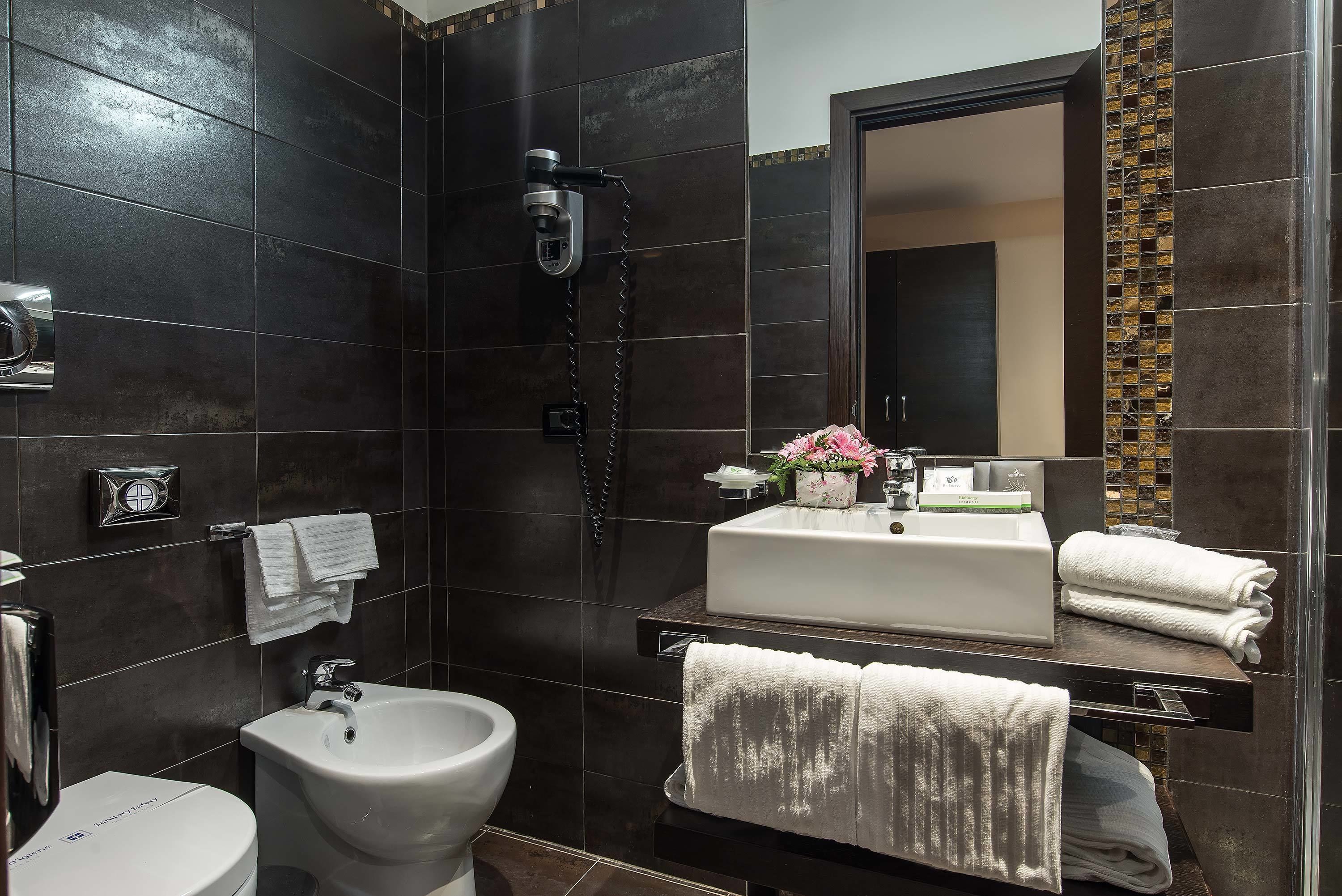 shower, free toiletries, hair dryer, slippers