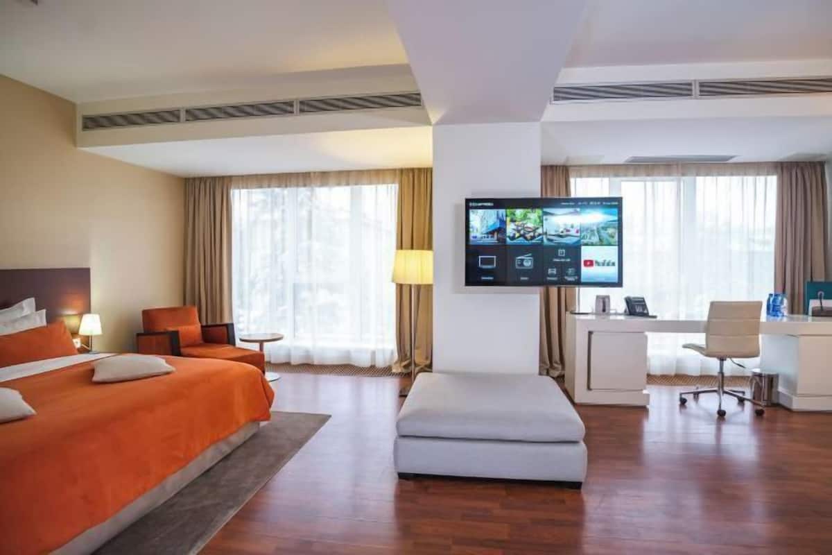 Premium bedding, memory-foam beds, minibar, in-room safe