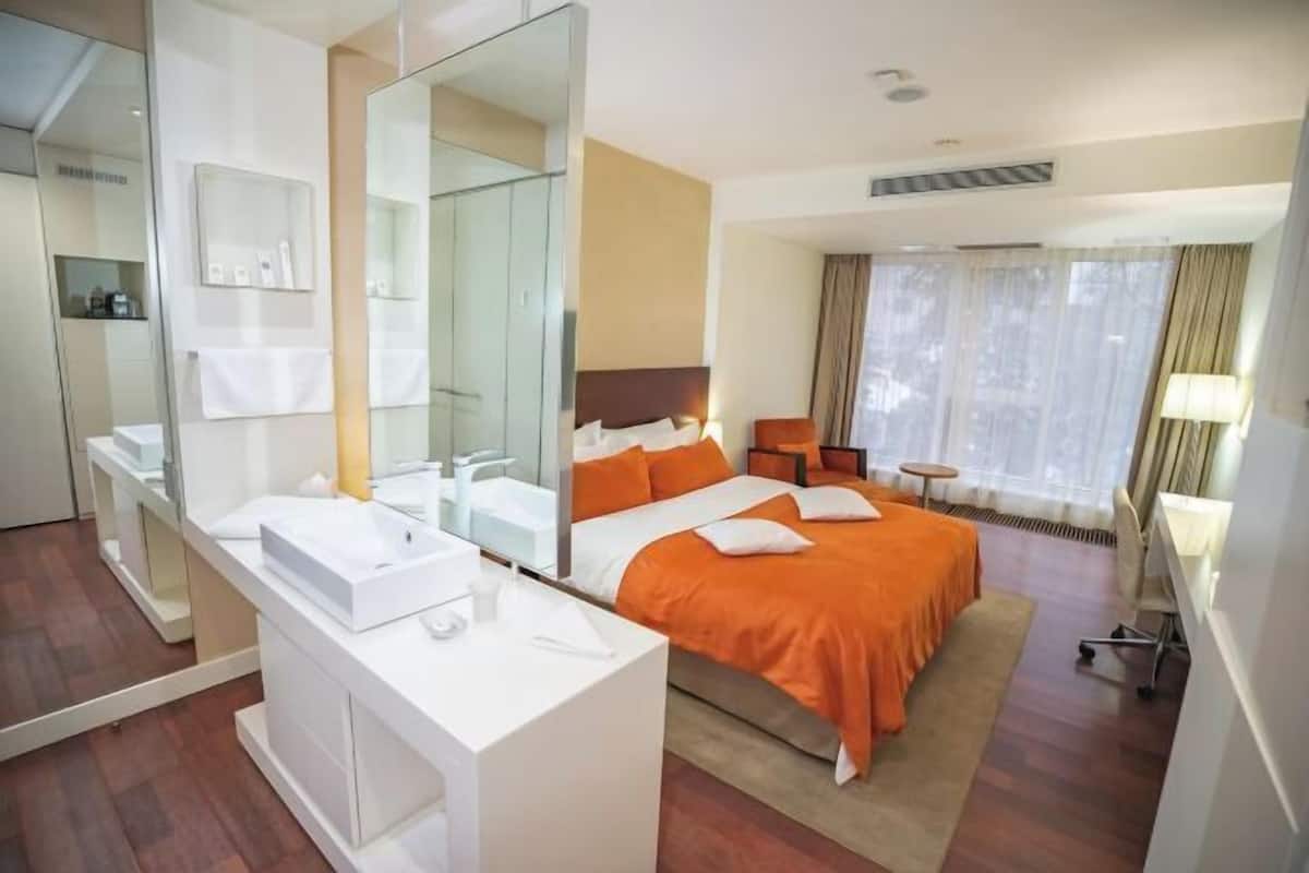 Premium bedding, memory foam beds, minibar, in-room safe