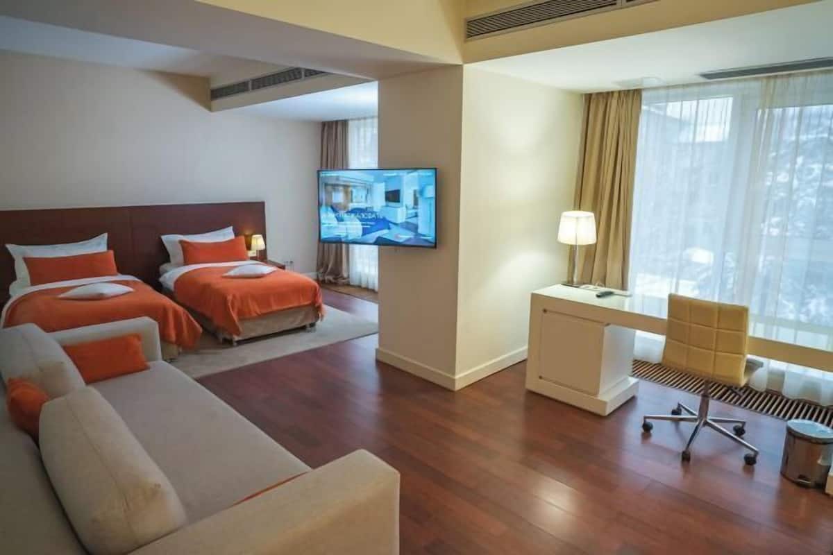 Premium bedding, memory-foam beds, minibar, in-room safe