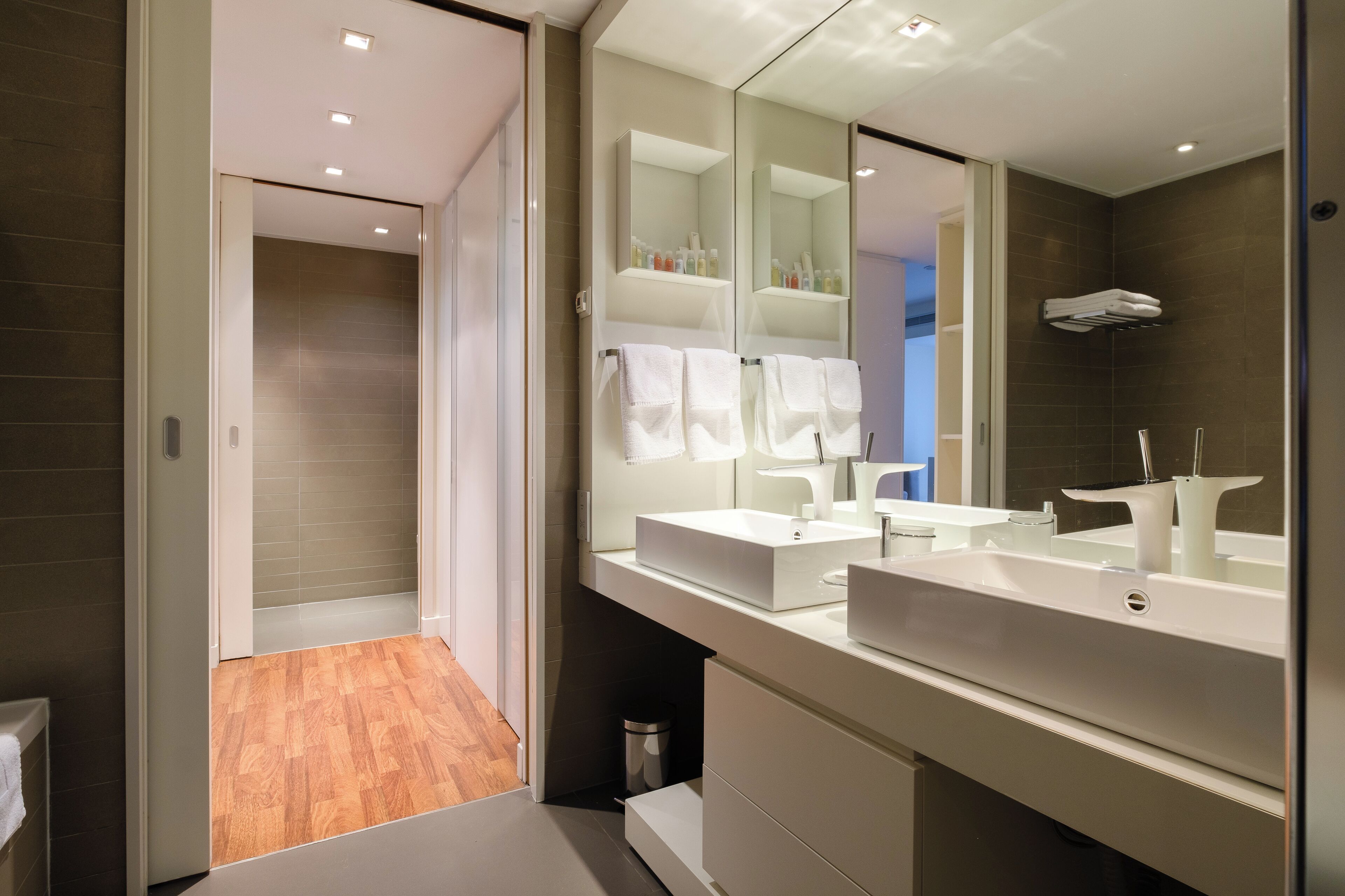 junior suite | bathroom | rainfall showerhead, free toiletries, hair dryer, bathrobes