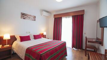In-room safe, desk, blackout drapes, free cribs/infant beds