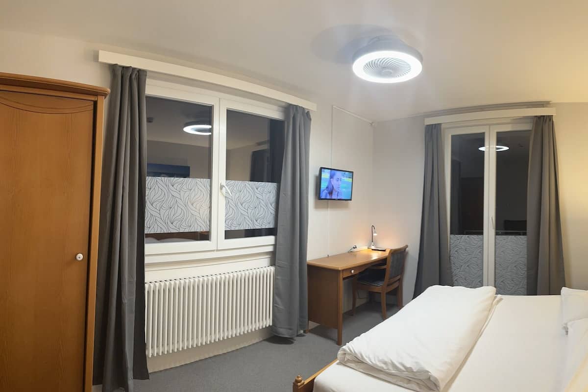 Pillowtop beds, desk, iron/ironing board, WiFi (free)