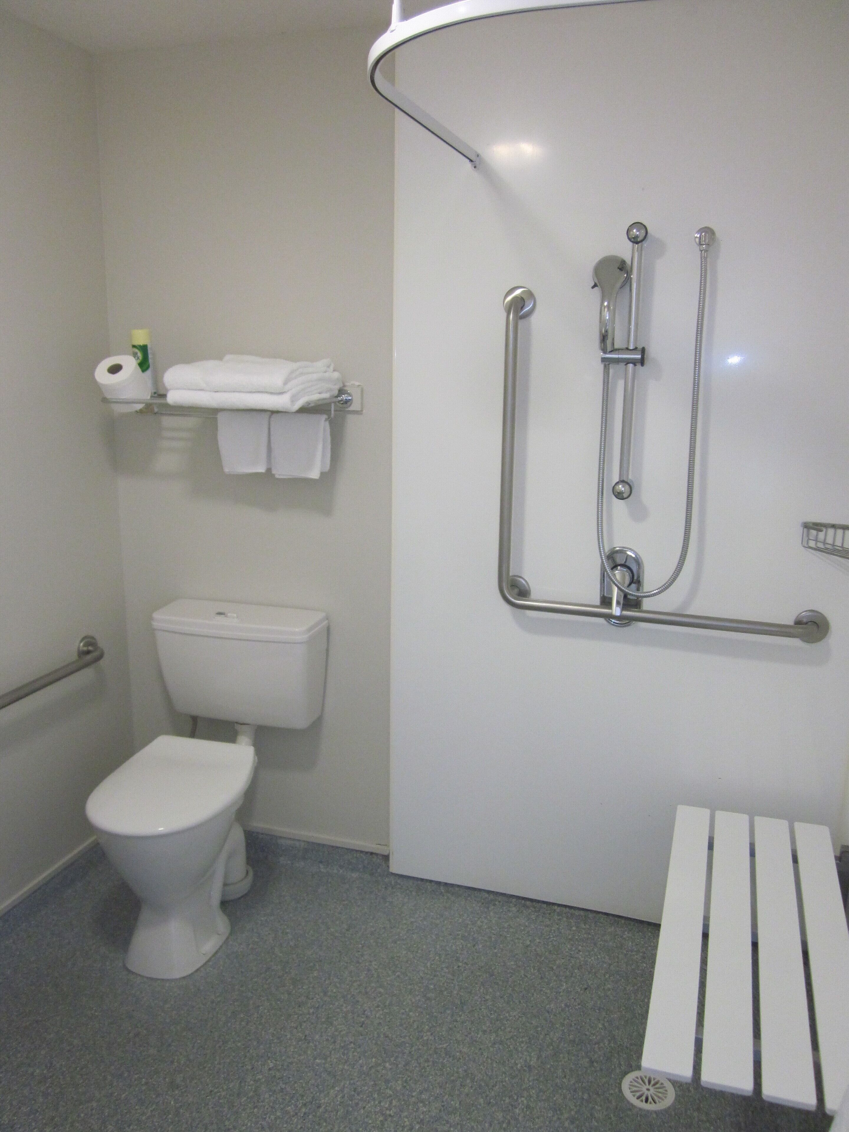 king studio, accessible | bathroom | shower, hair dryer, towels