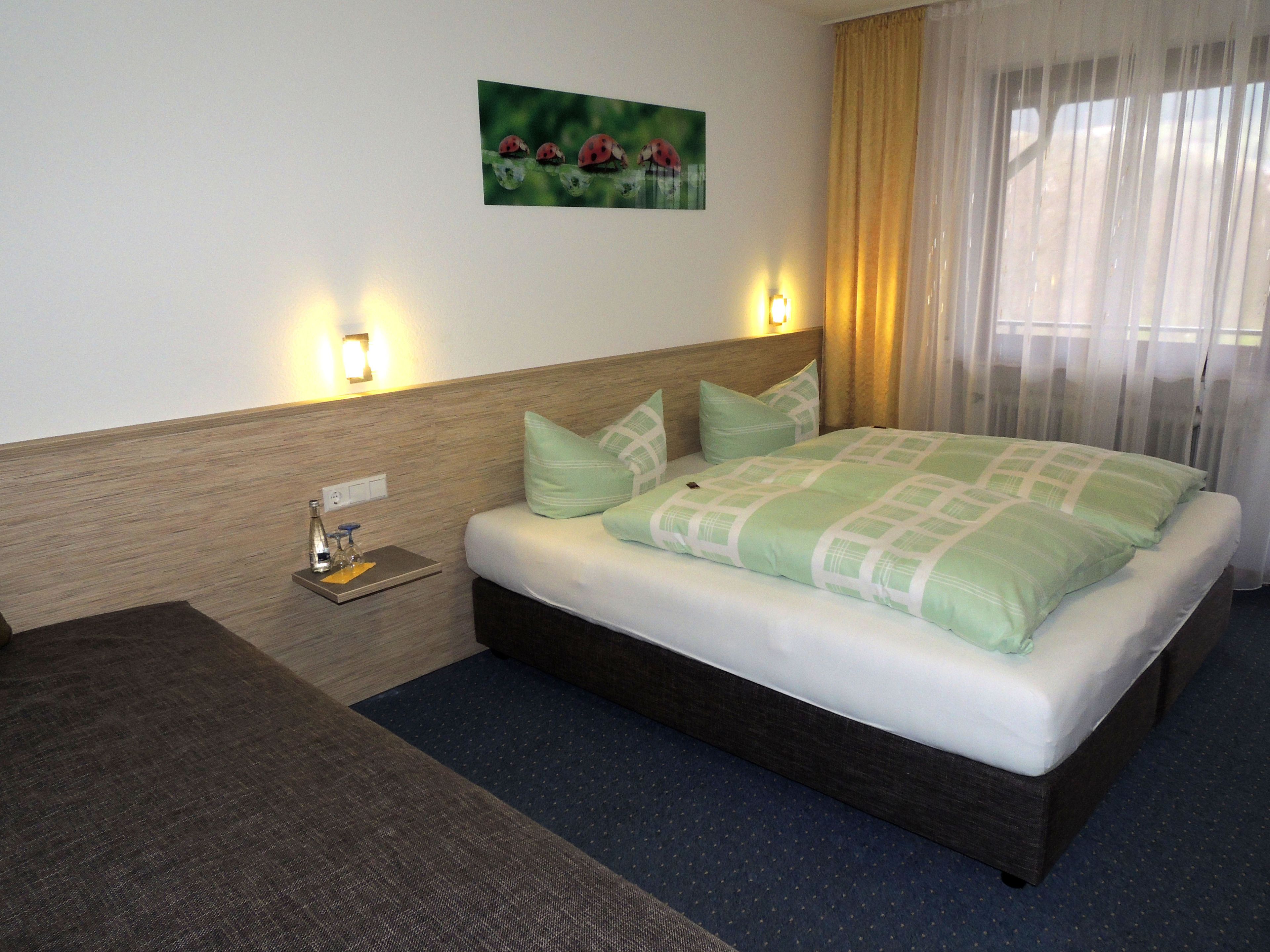 triple room | premium bedding, down duvets, desk, blackout curtains