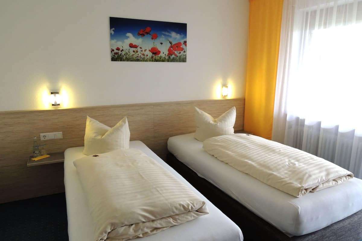 premium bedding, down duvets, desk, blackout curtains