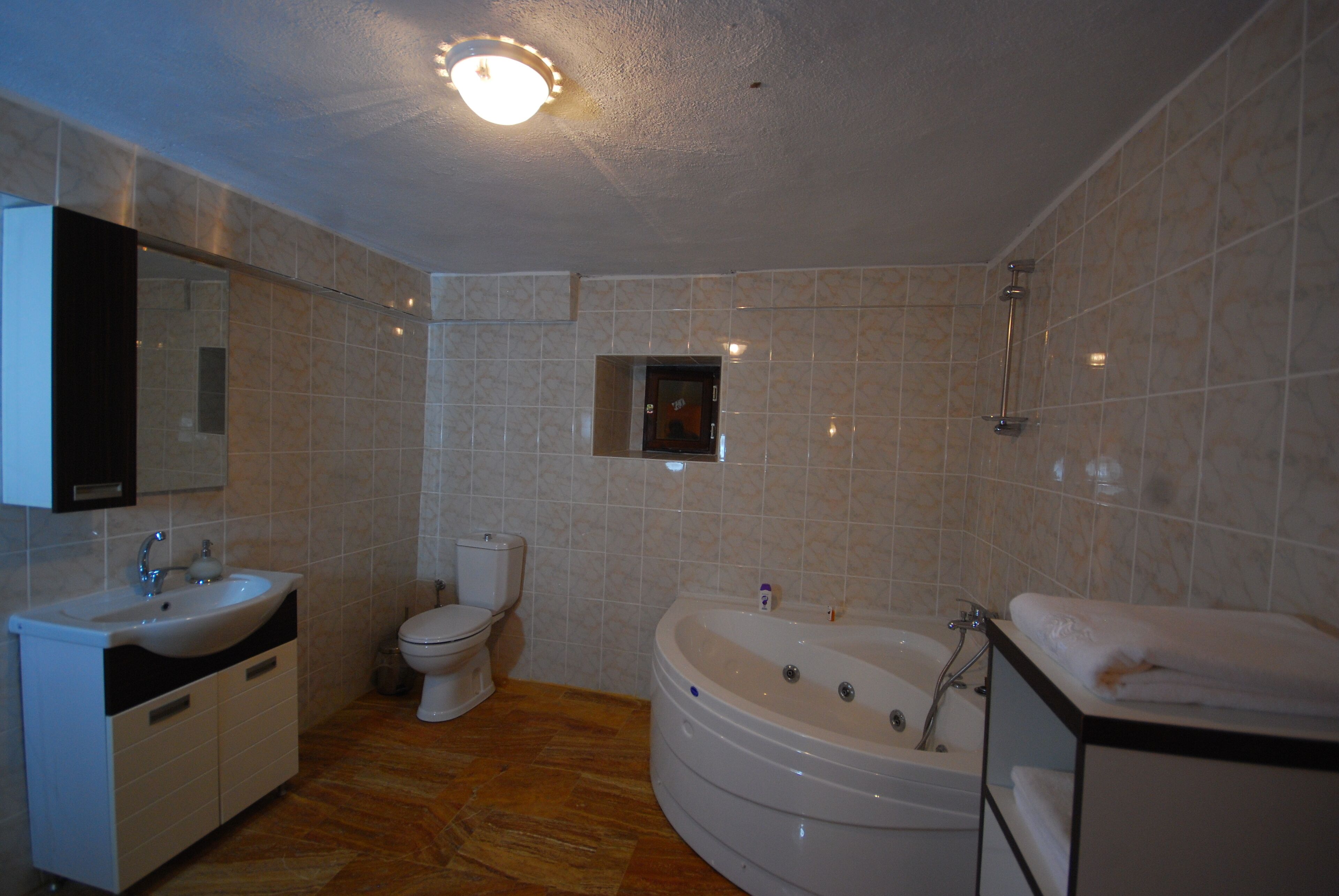 hair dryer, bathrobes, slippers, towels