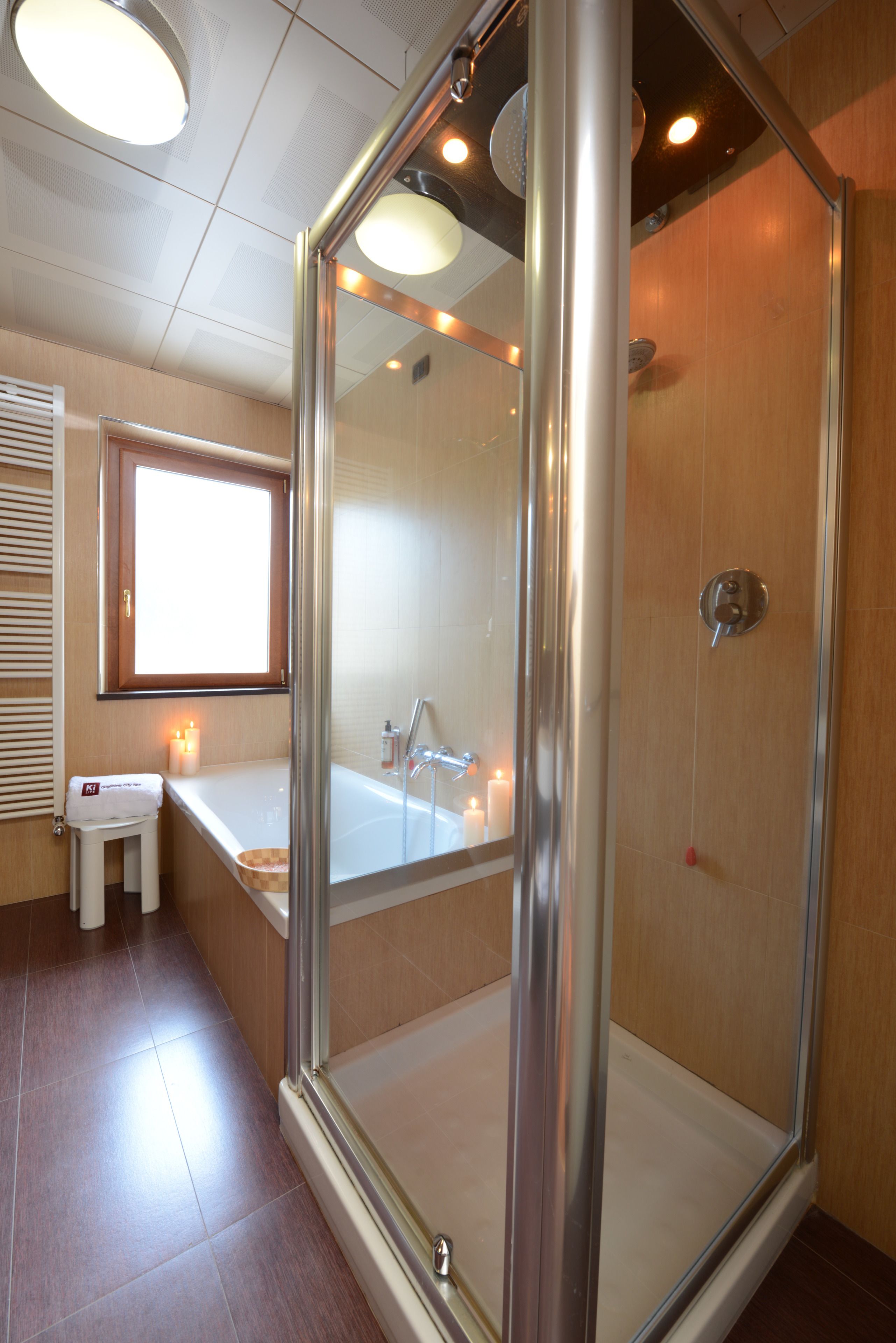 double room single use | bathroom | separate bathtub and shower, rainfall showerhead, free toiletries