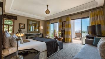 Suite Junior, 1 grand lit, vue océan | Minibar, coffres-forts dans les chambres, bureau, Wi-Fi gratuit