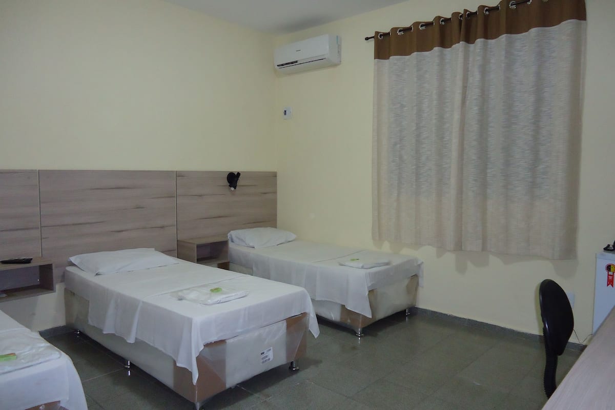 Standard Triple Room | Minibar, desk, blackout drapes, WiFi (free)