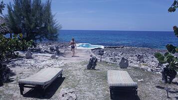 Beach nearby, white sand, beach towels, beach massages