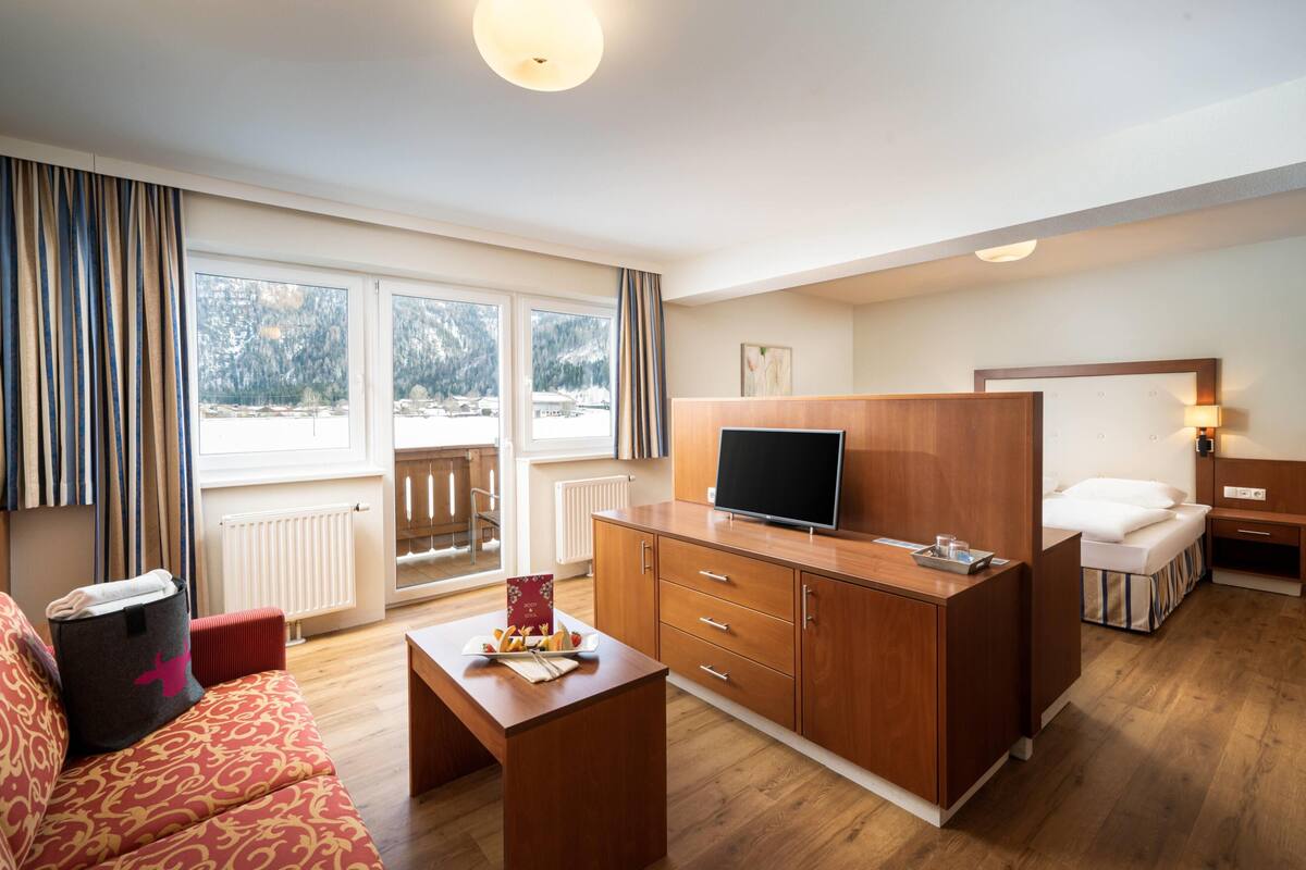 Family Room, Mountain View | Minibar, in-room safe, desk, laptop workspace