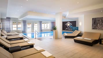 Indoor pool, outdoor pool, pool umbrellas, pool loungers